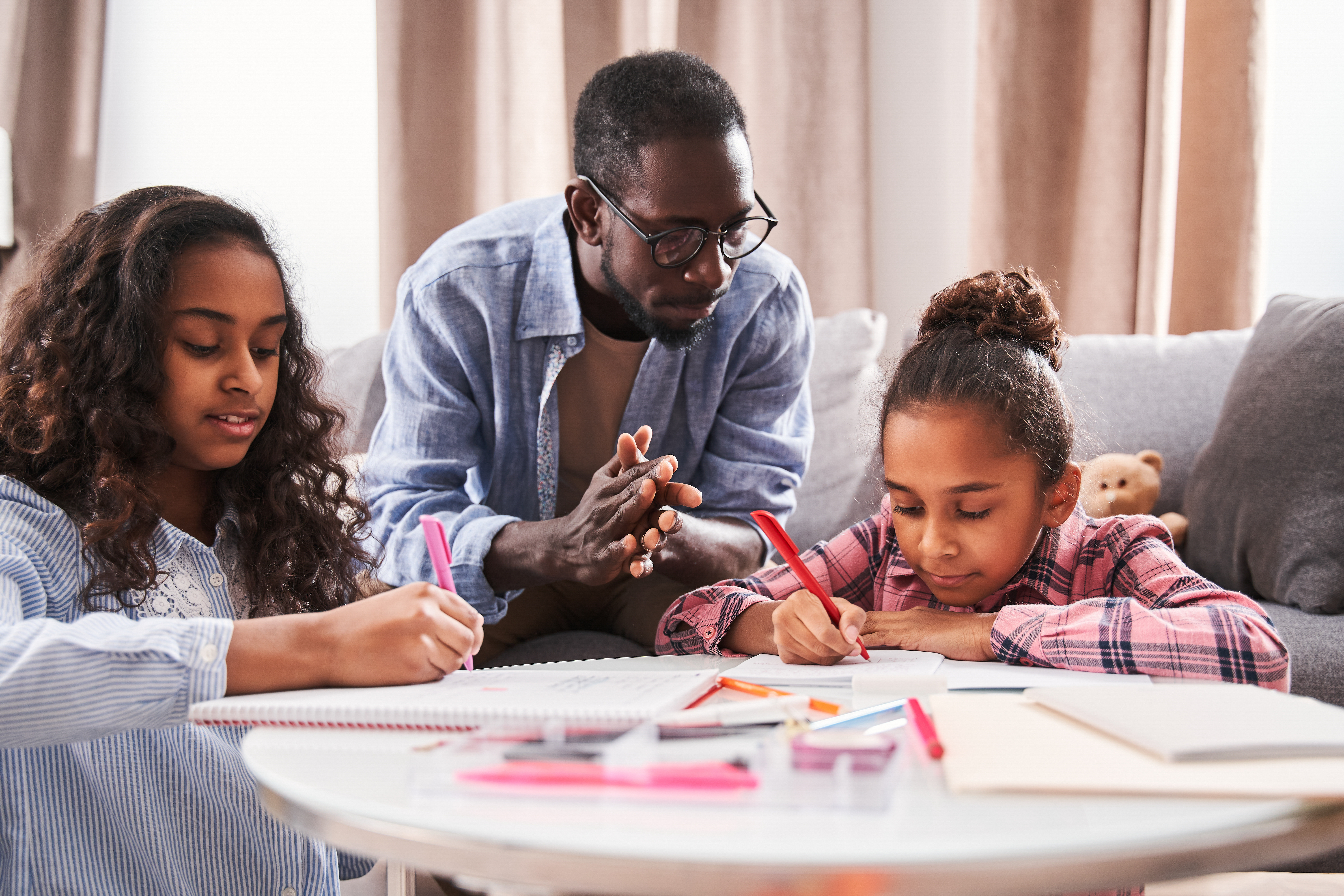 Father with two daughters, drawing