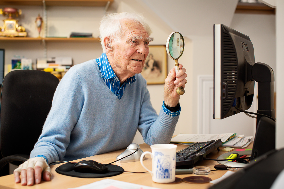 Pat Butler with magnifier