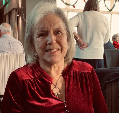 Carol Ozanne smiling into camera