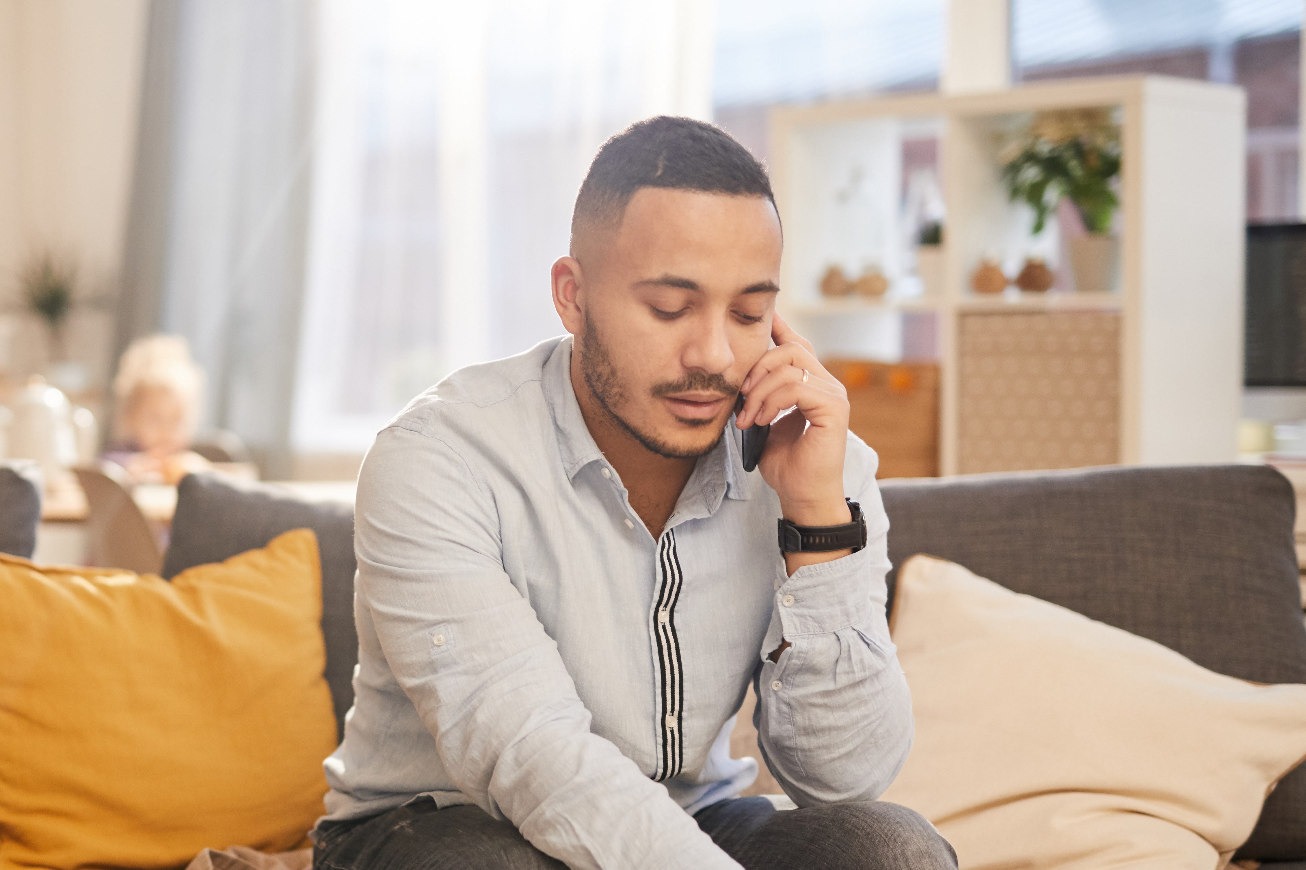 Man on phone counselling