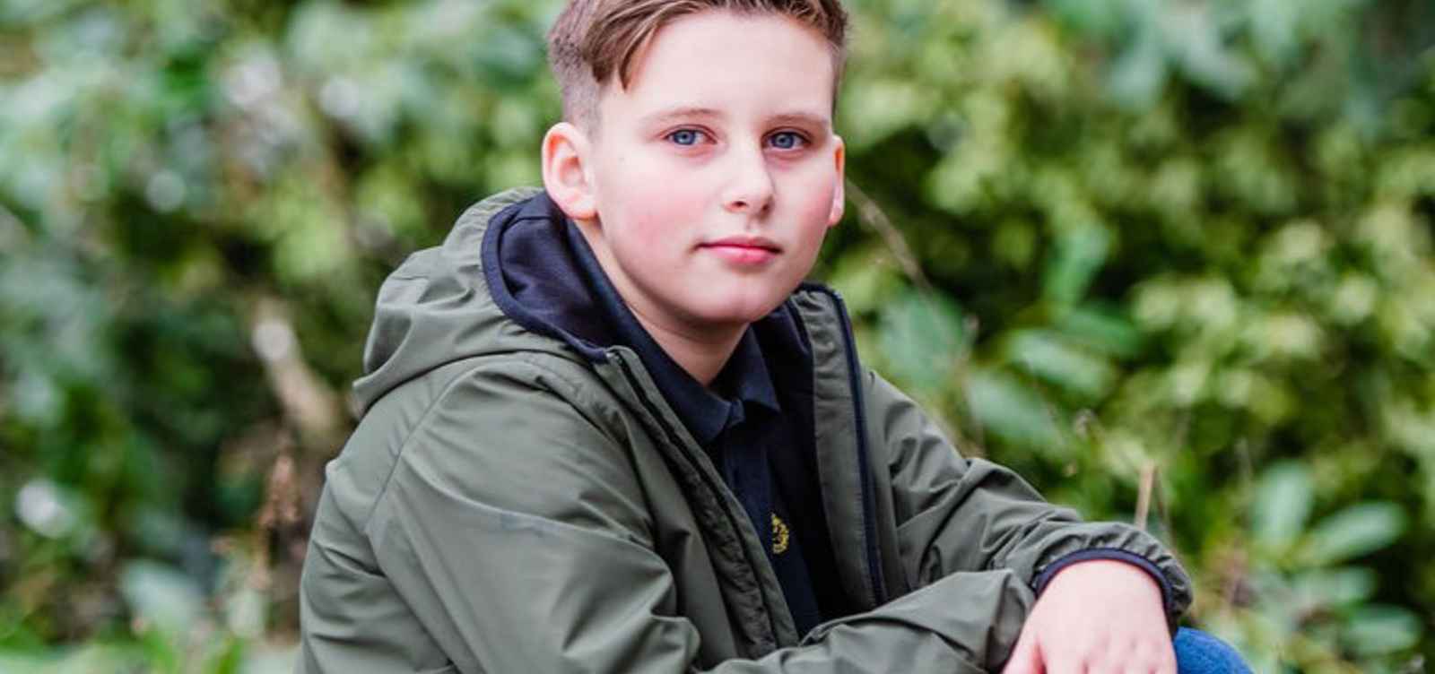 Freddie outside looking into the camera