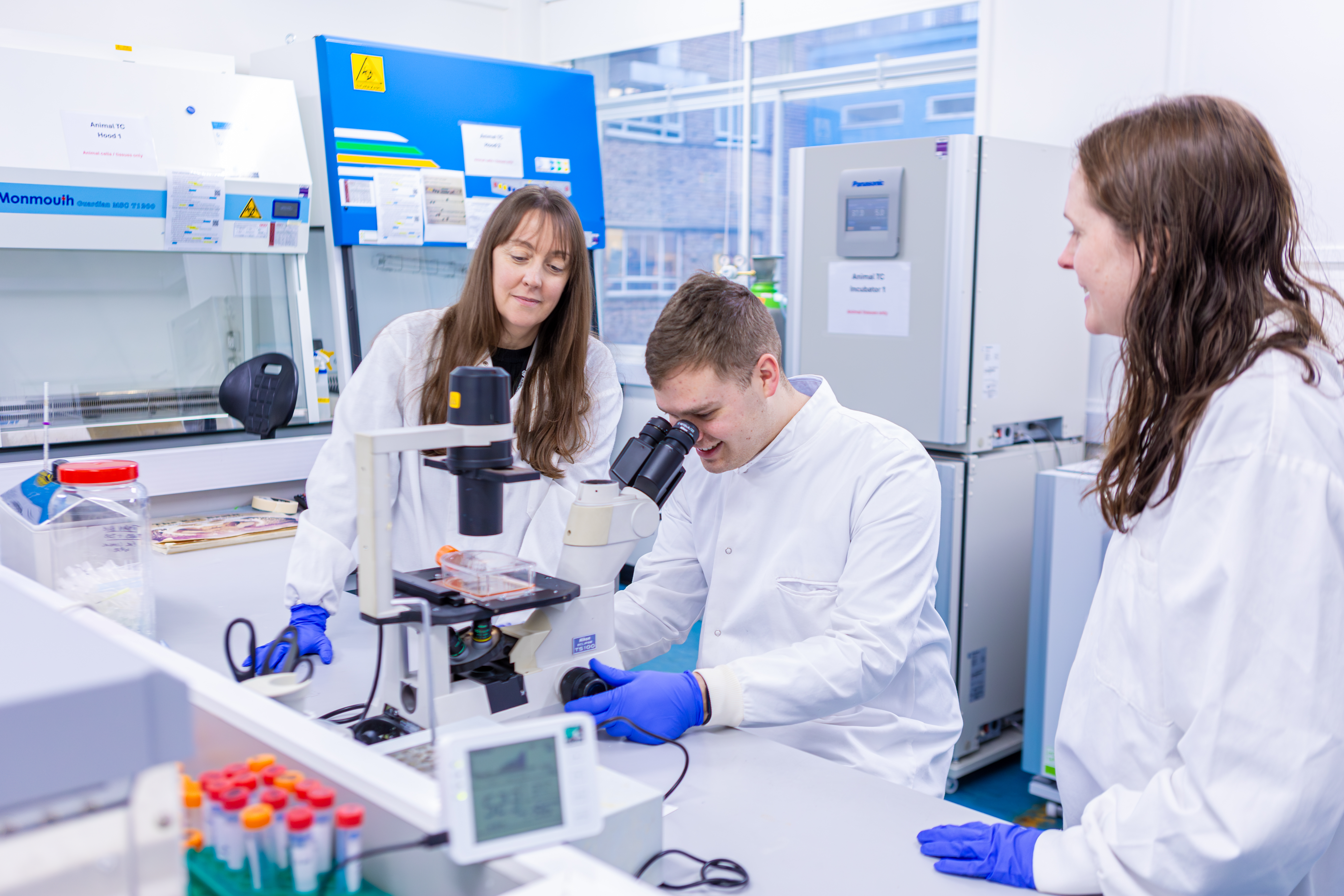 Dr Hill and team in the research lab