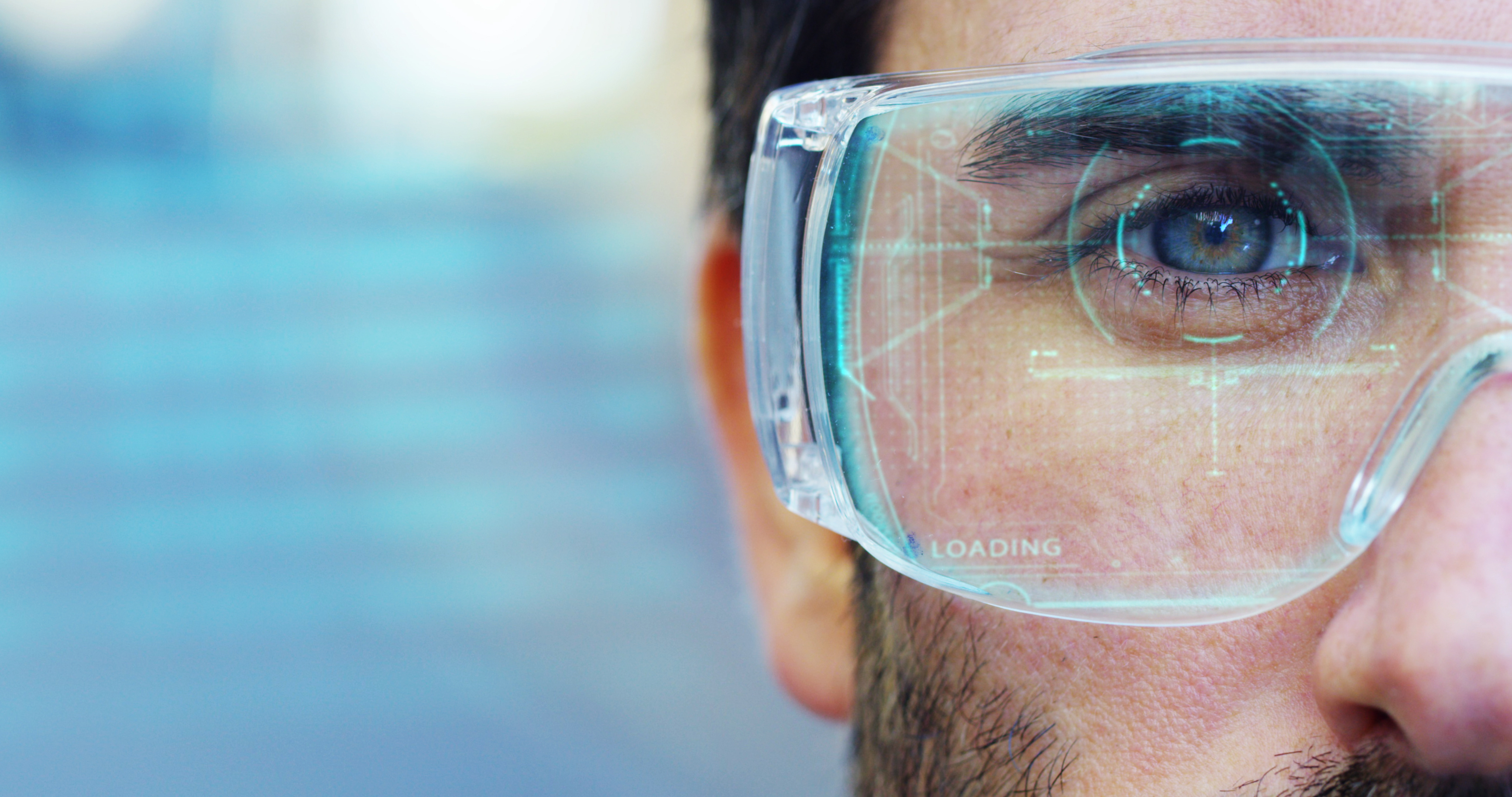 Close up of man wearing technology glasses