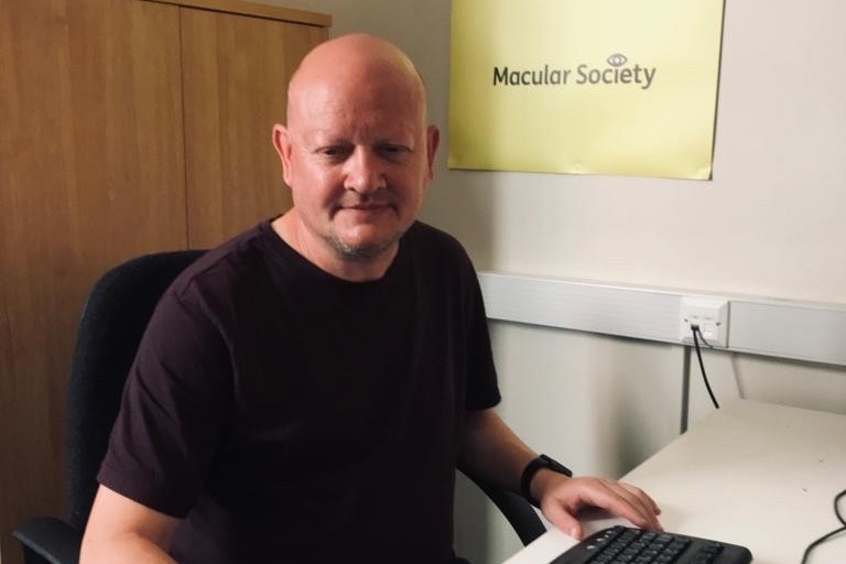 Colin Daniels at desk