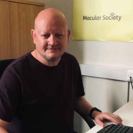 Colin Daniels at desk