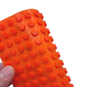 Bright orange tactile bumper pad pack showing raised pads