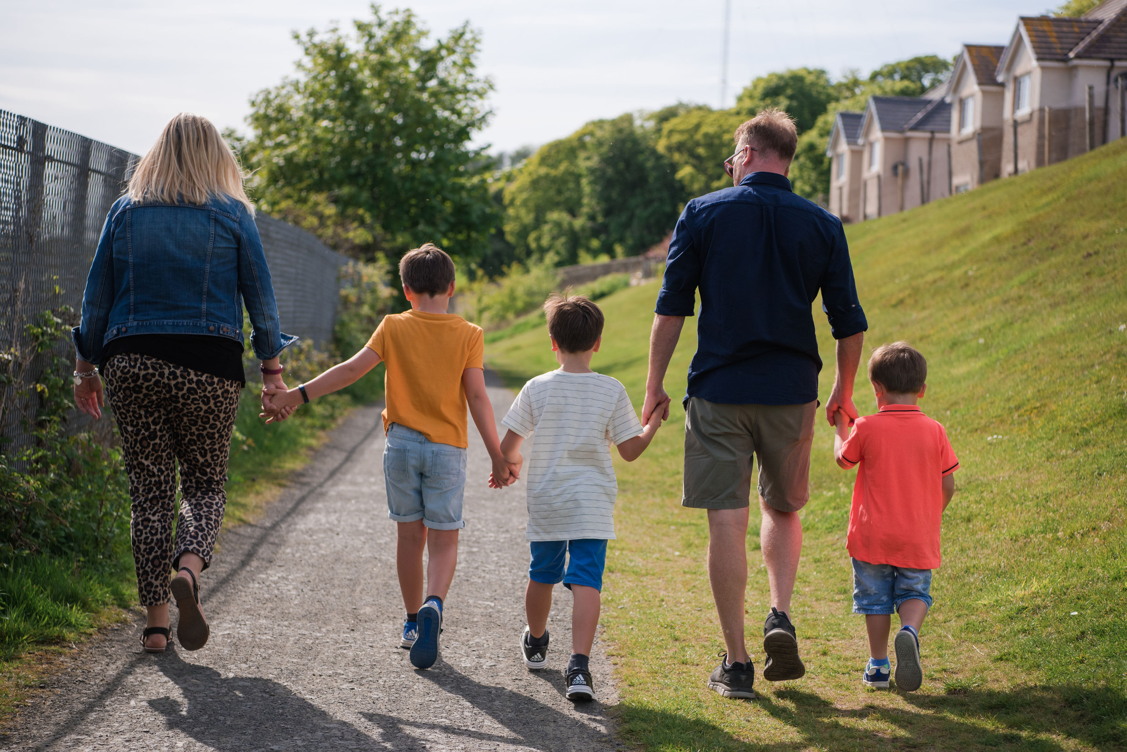 Kelly and family walking outside