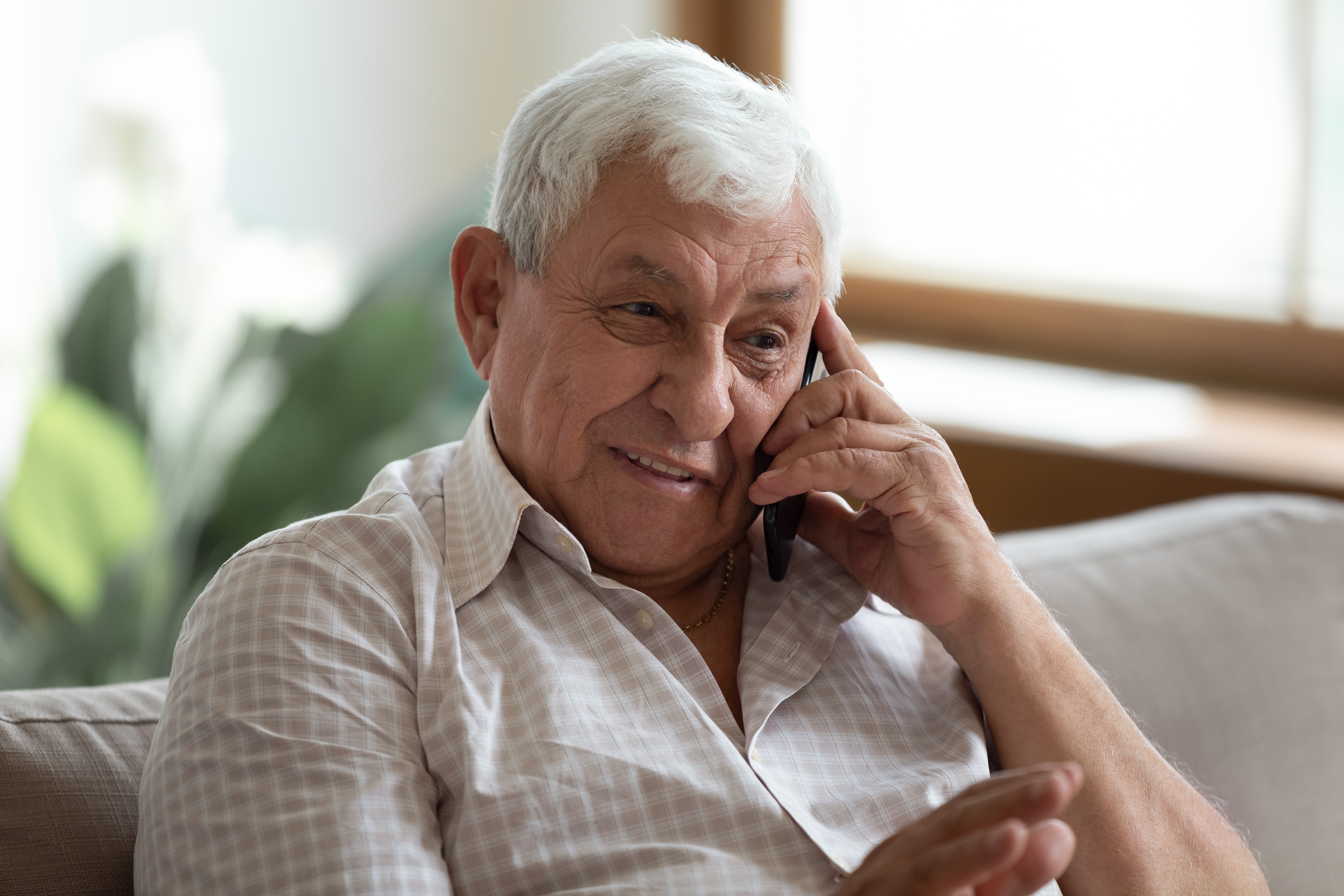 Elderly man on phone