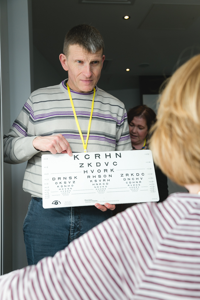 low vision clinic, someone having eye test