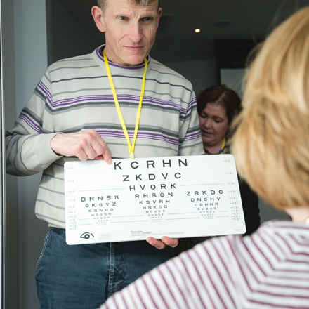 low vision clinic, someone having eye test