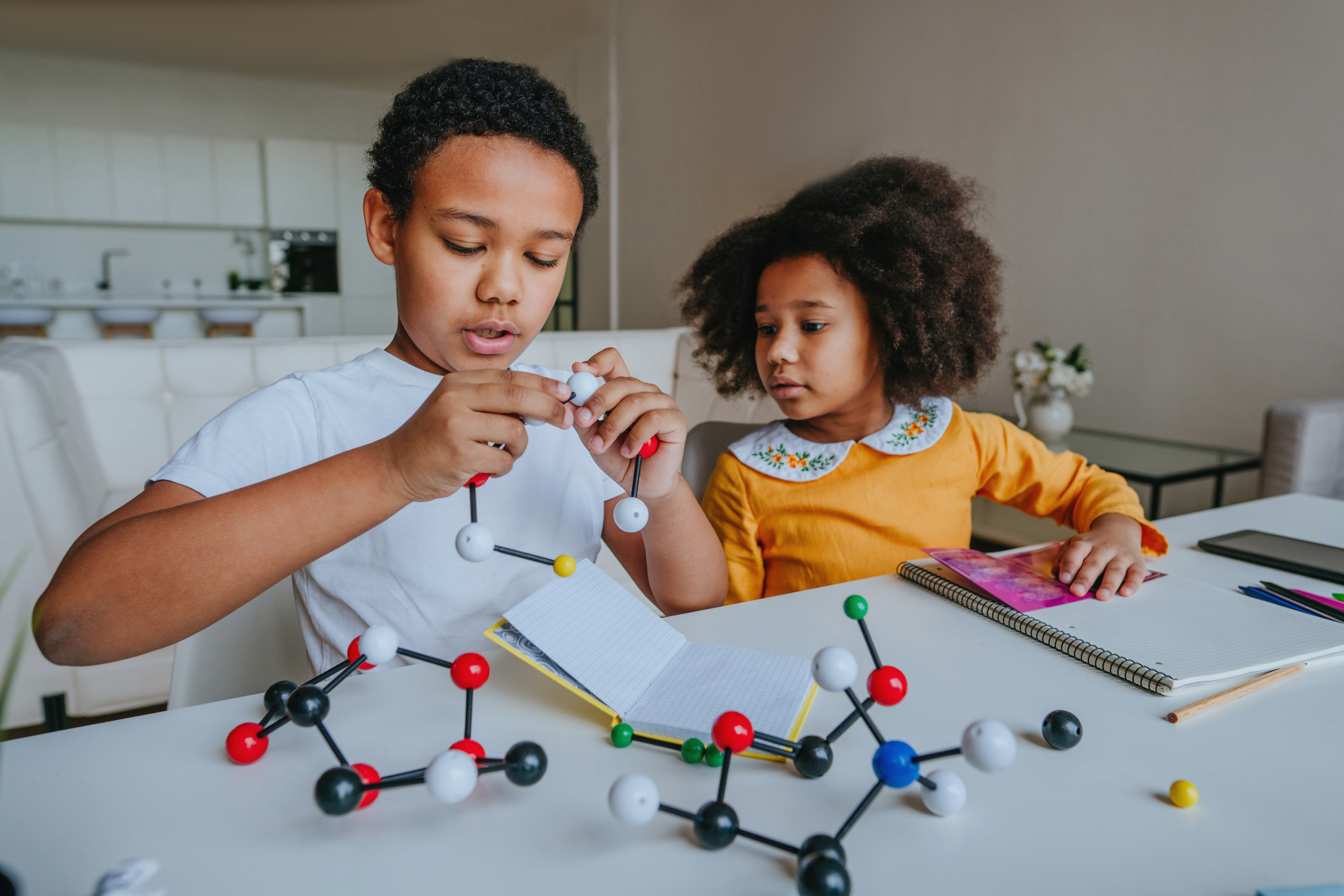 Kids playing with scientific models