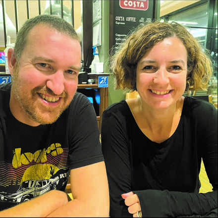 Chris and Kathryn Owen smiling at camera