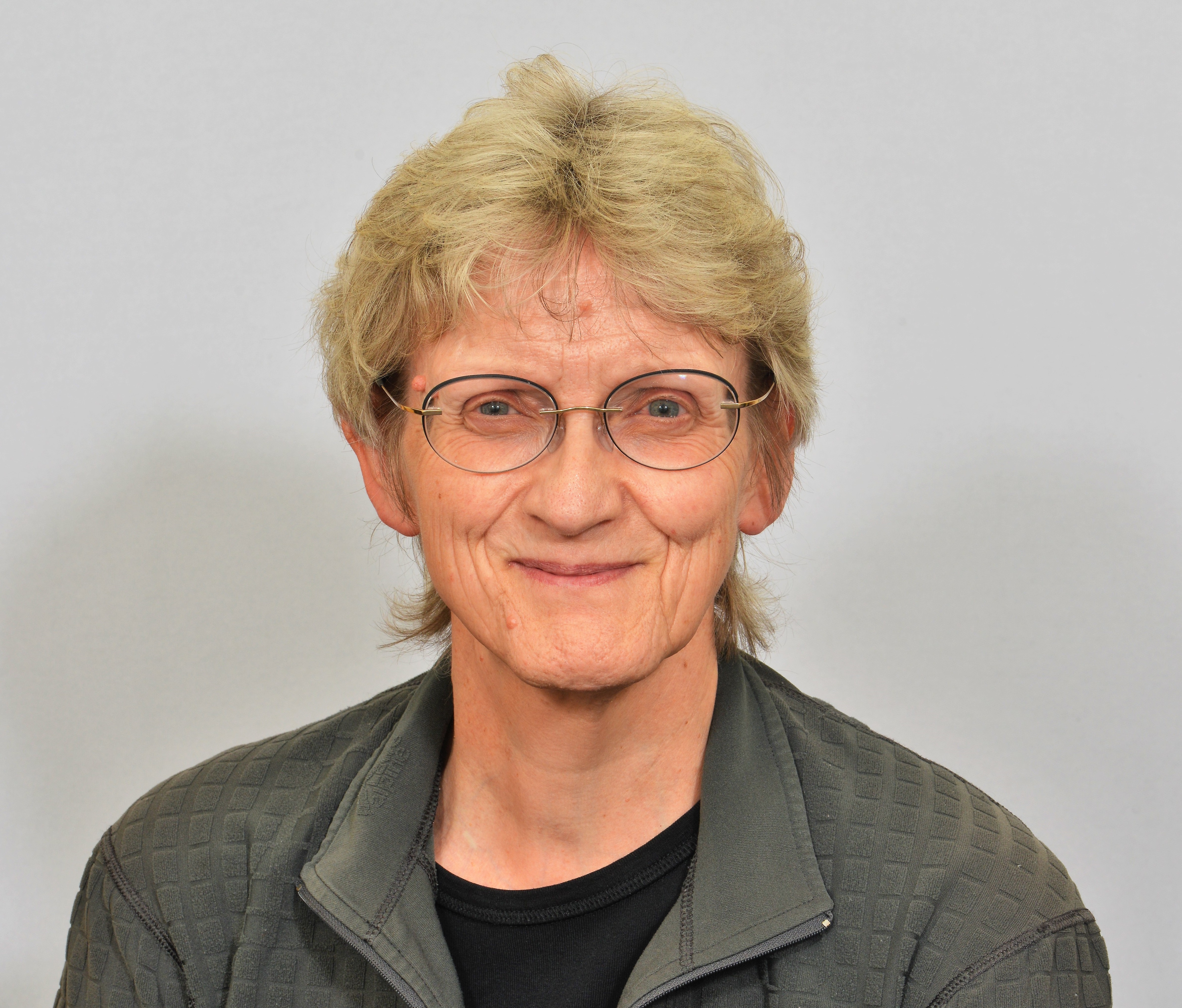 Christine Dickinson smiling into camera