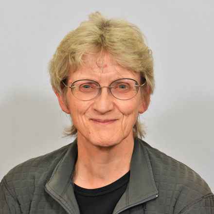 Christine Dickinson smiling into camera