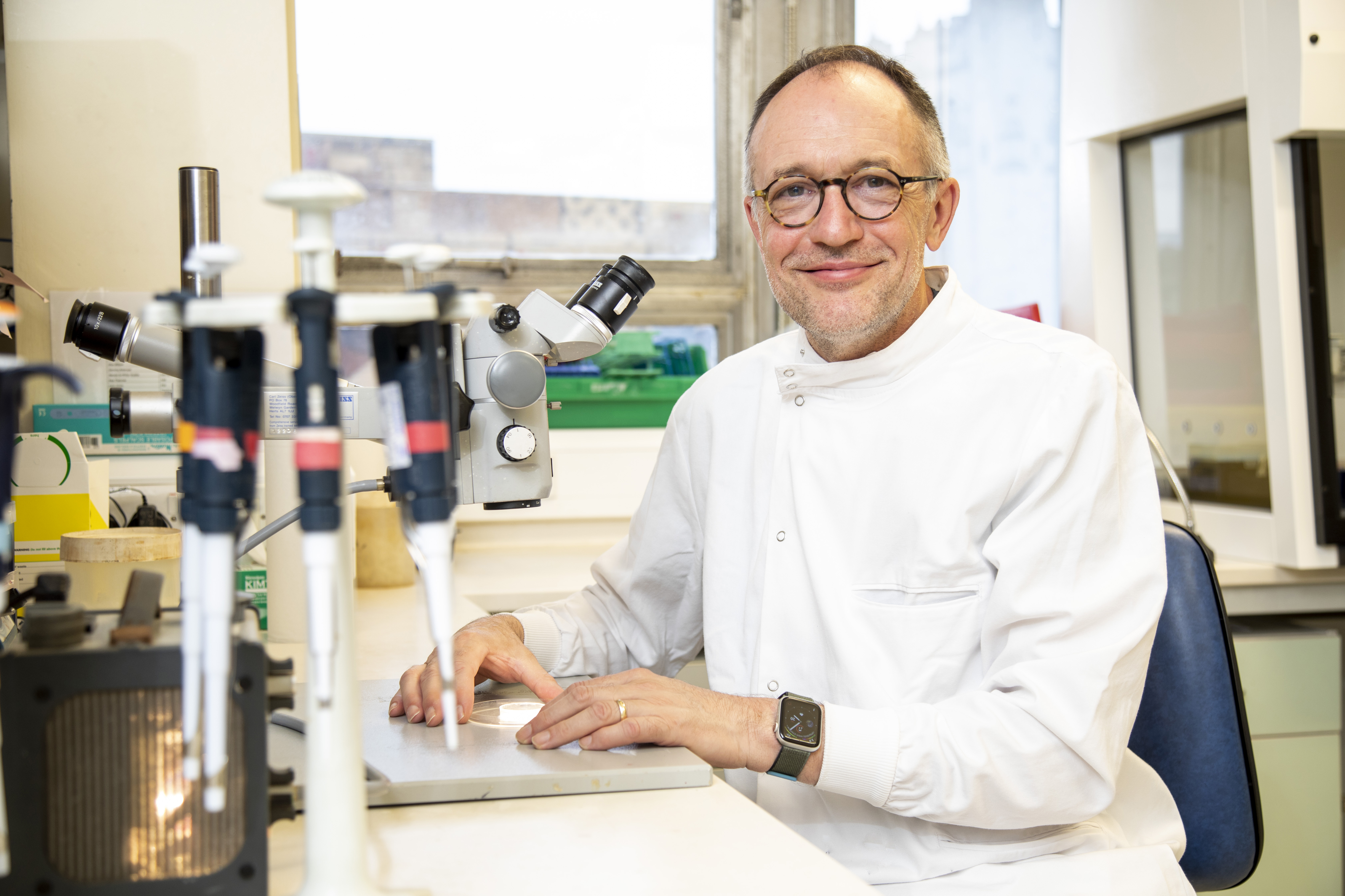 Andrew Dick looking into camera