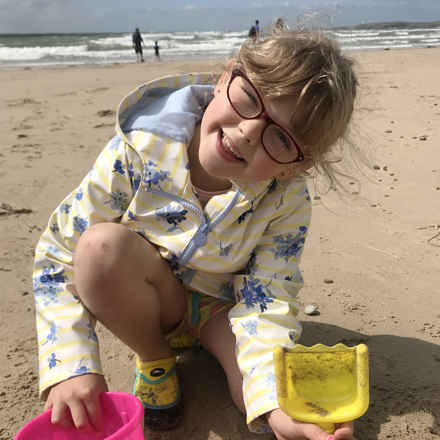 Matilda playing on beach