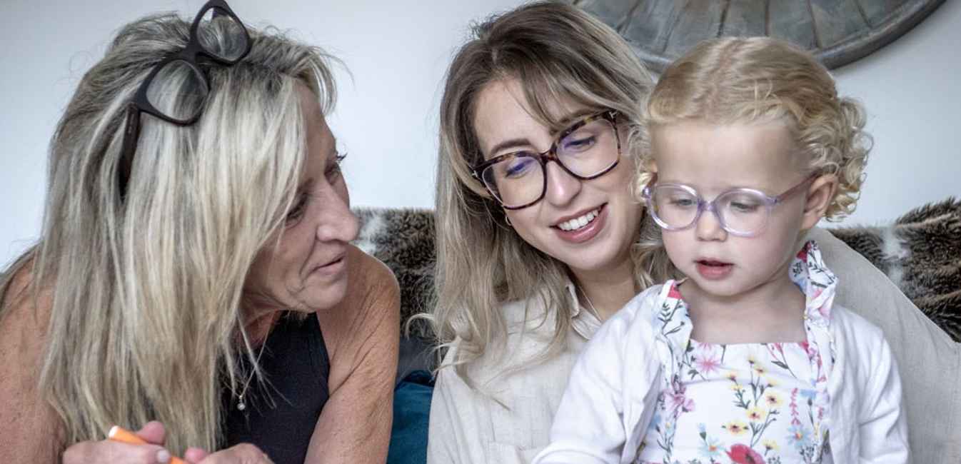 Gill with her daughter and granddaughter playing together