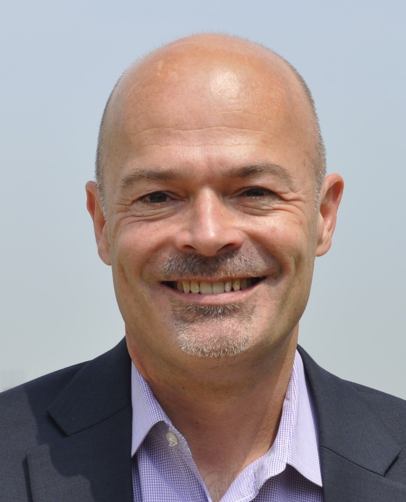 Tim Jackson smiling into camera