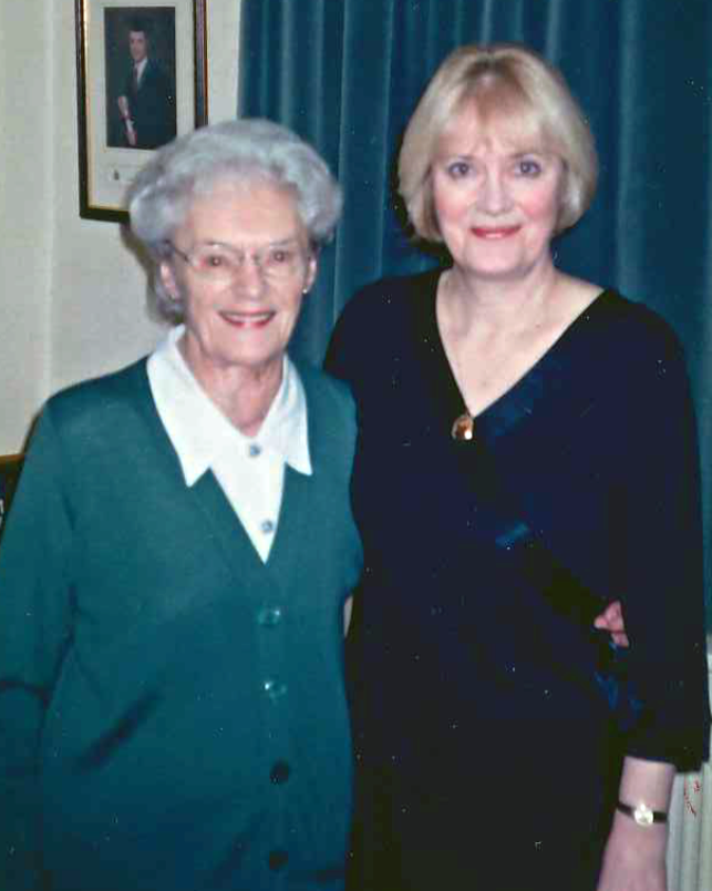 Sheila and mother, Minnie smiling and hugging