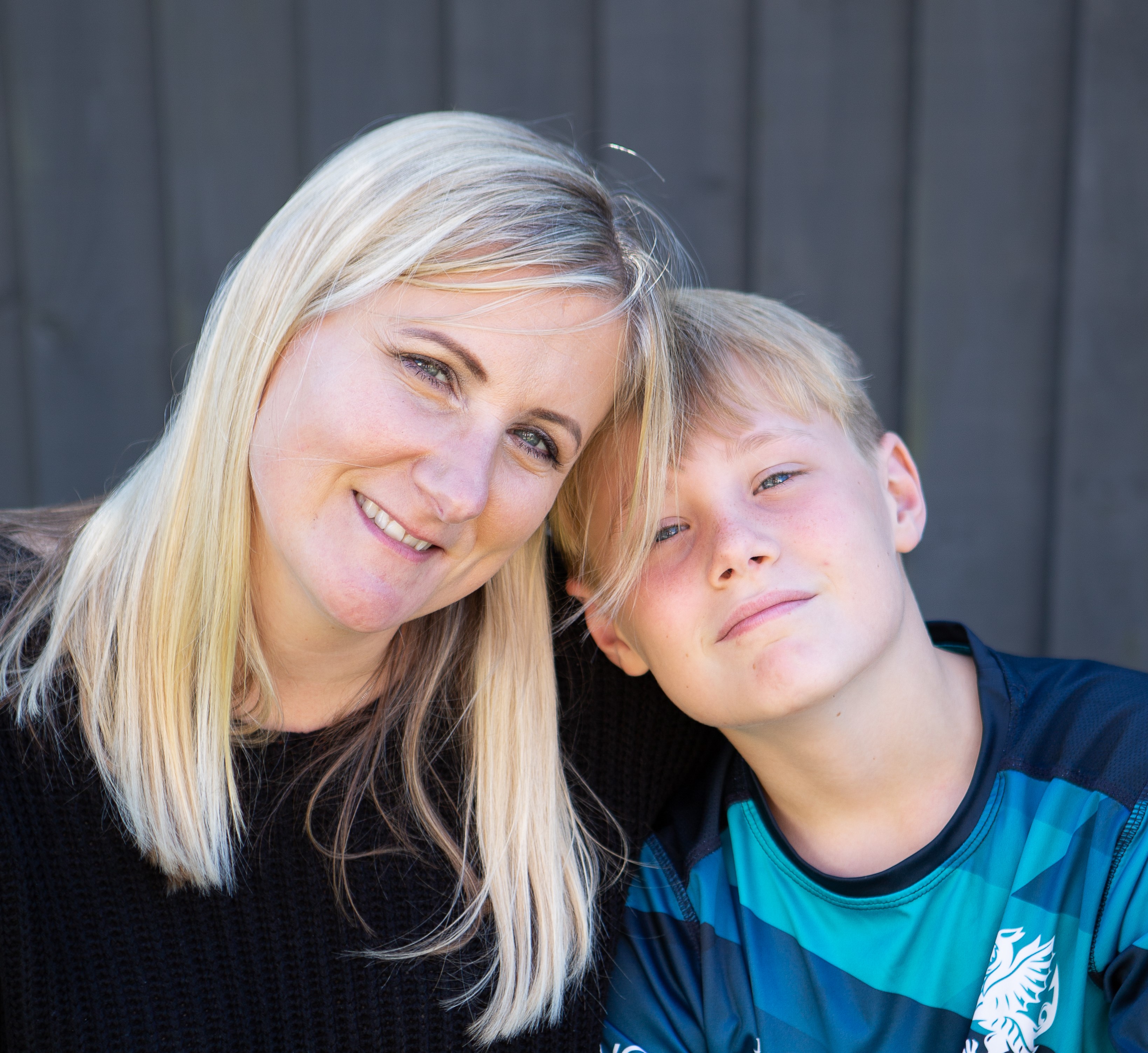 Sian with her son, Archie, smiling at the camera
